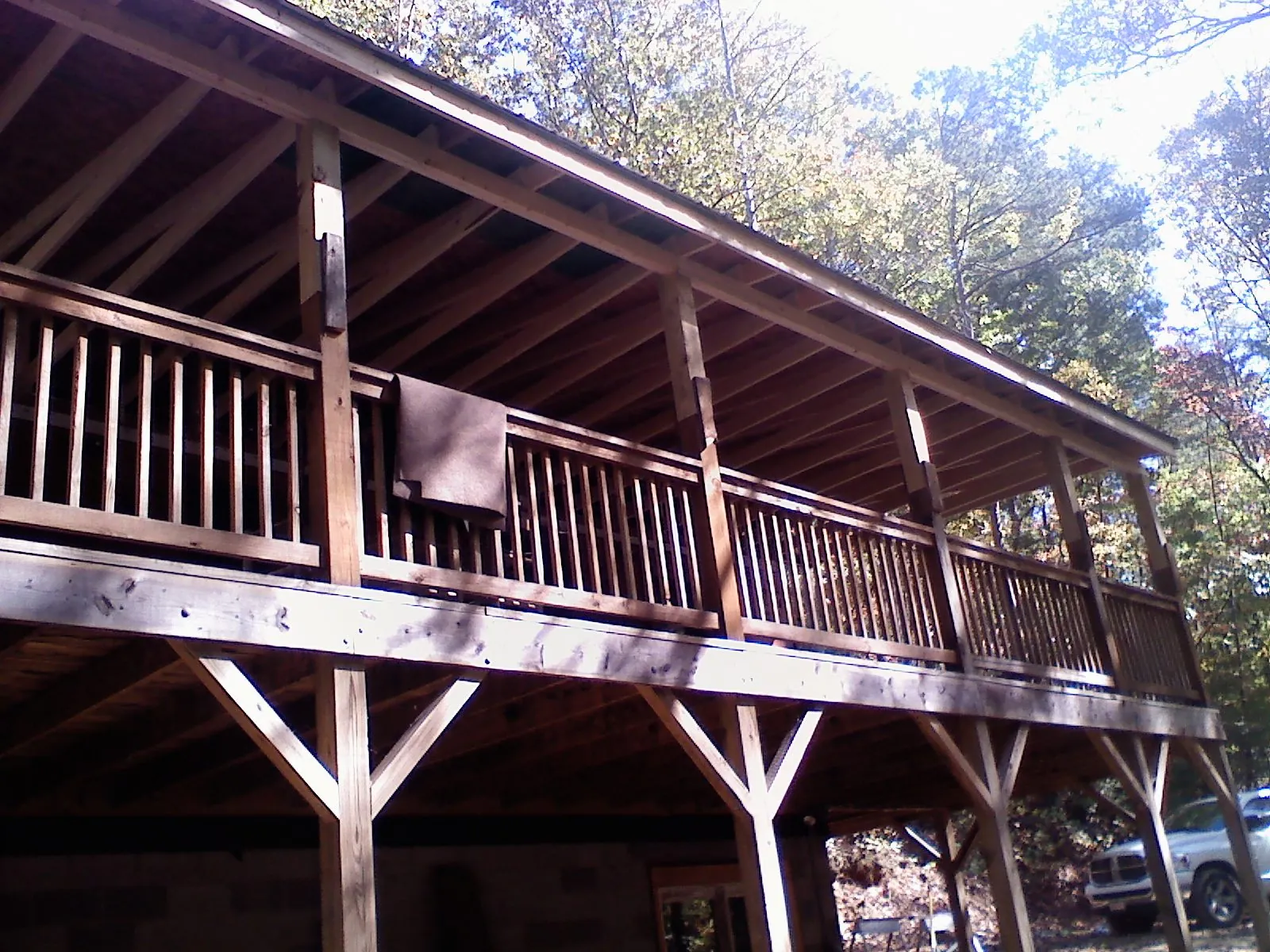 Timber framing under a new elevated porch and deck — Roof Leak Repair in Glennville by Roofing Brothers